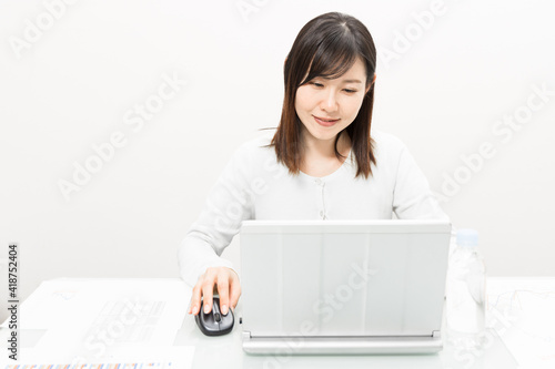 Woman working on a laptop PC