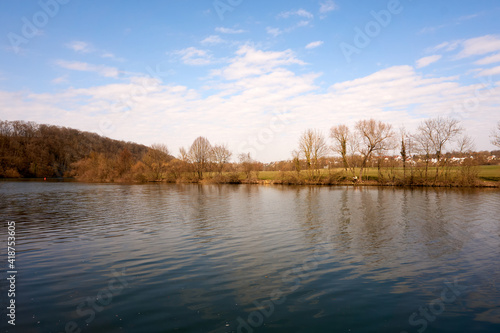 beautiful view of the neckar river in germany under a blue sky