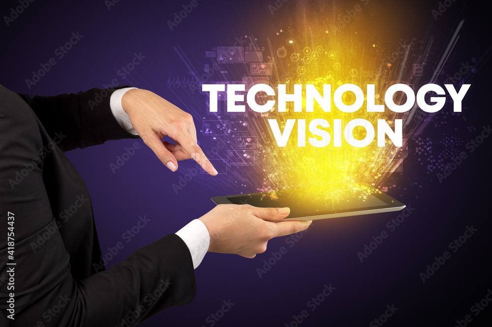 Close-up of a touchscreen with TECHNOLOGY VISION inscription, innovative technology concept