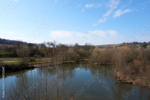 beautiful view of the neckar river in germany under a blue sky