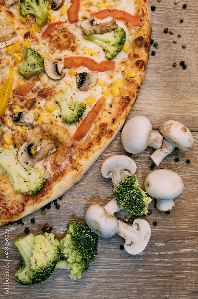Healthy vegetable pizza. Pizza with broccoli and mushrooms