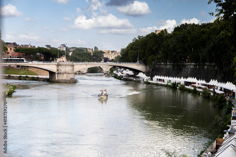View of Tiber river from the bridge in Rome, Italy.