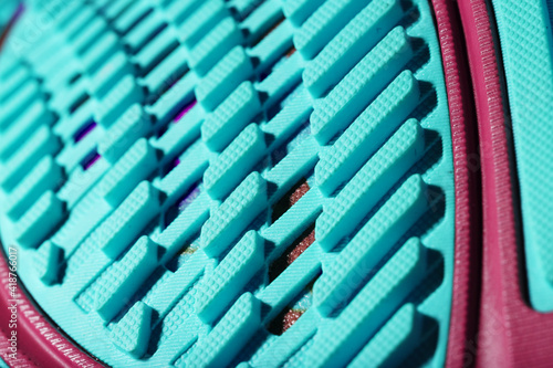 Turquoise outsole tread with sports sneakers for jogging and fitness. Sports style  close-up
