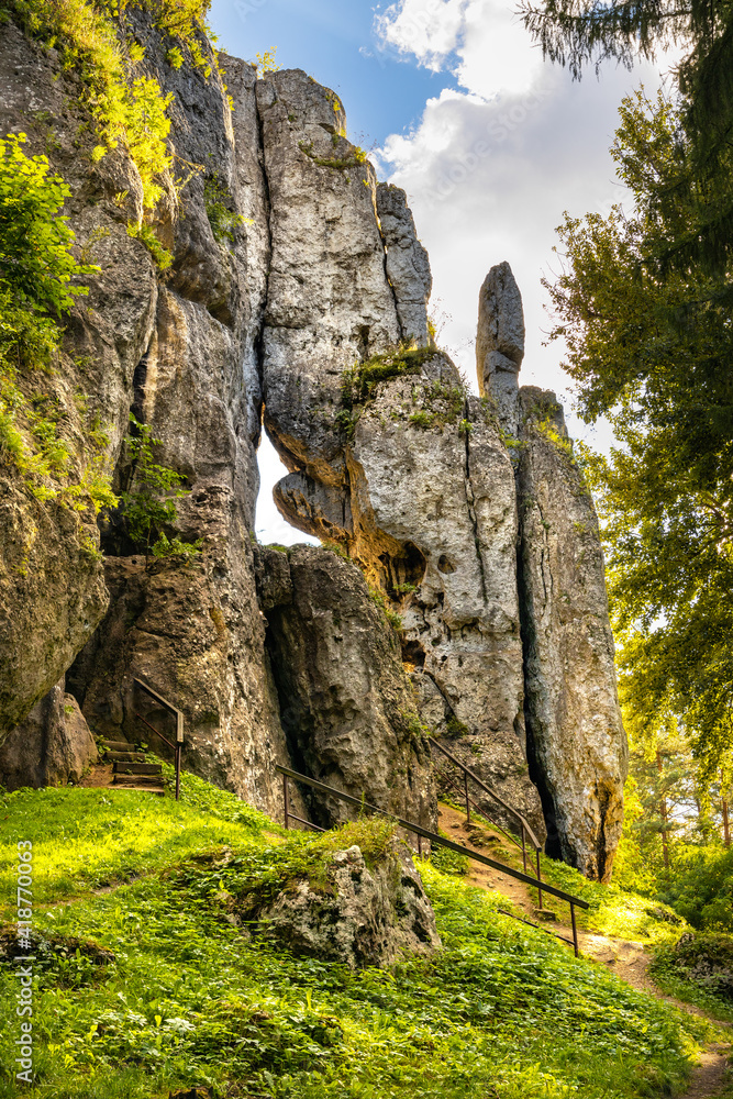Jurassic limestone rock formations and natural caves in Gora Birow Mountain near Ogrodzieniec Castle, in Podzamcze at Cracow-Czestochowa upland in Silesia in Poland