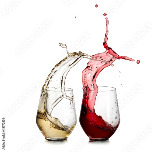 Red and white wine up from two stemless glasses photo