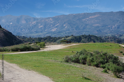 High elevation park landscape in Santa Barbara with a view of the Santa Ynez mountains on a warm spring day