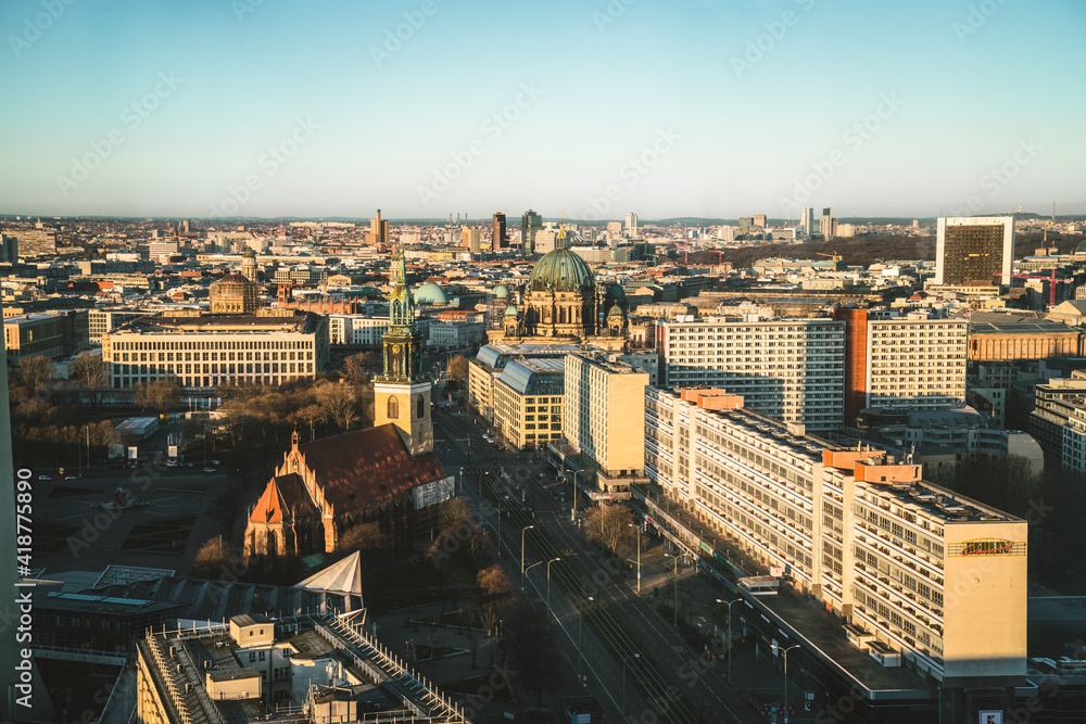 Berlin, Germany - March 4, 2021: Aerial view of Berlin city skyline towards Berlin cathedral and Potsdamer Platz during sunset.