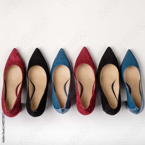 Footwear for women. High heels. Top view different colors of high heels.