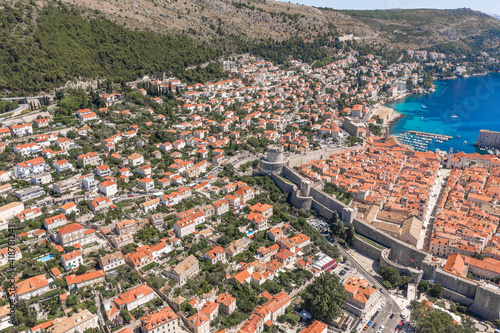 Aerial drone shot of Minceta Fort on Dubrovnik old town wall with view of stradun street in Croatia summer noon