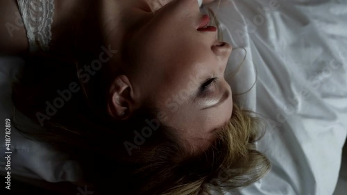 excited woman is feeling extasy in bedroom, orgasm and pleasure, sex and self-satisfaction, closeup
