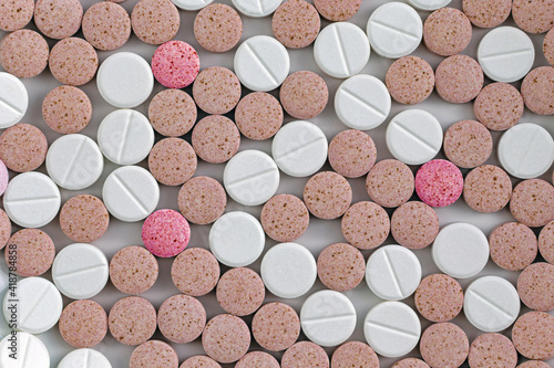 Colorful medical pills, tablets and capsules from above; color photo. photo