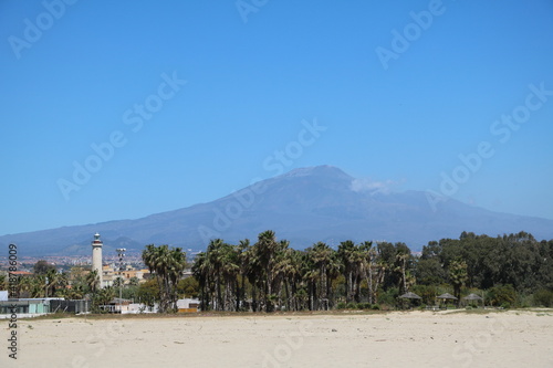 Fototapeta Naklejka Na Ścianę i Meble -   La Playa and Volcano Etna in Catania, Sicily Italy