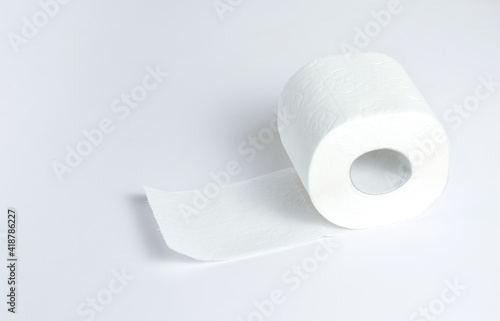 Toilet paper on a light background, daily hygiene.