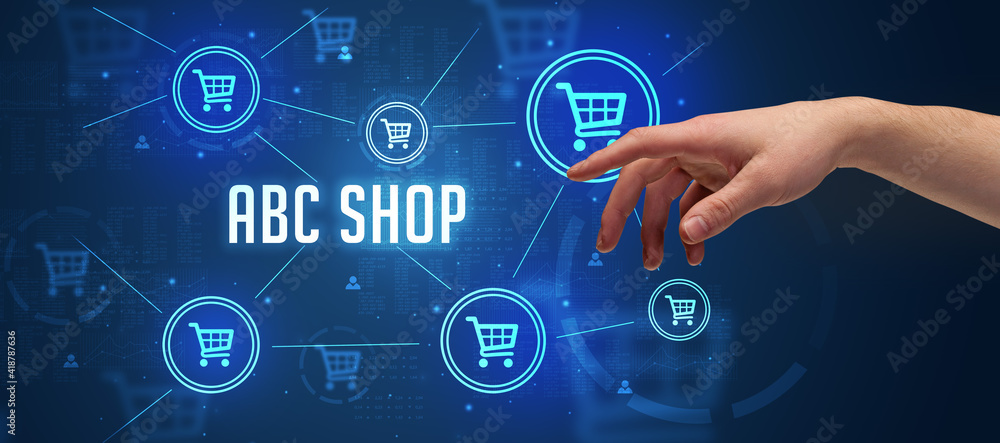Close-Up of cropped hand pointing at ABC SHOP inscription, online shopping concept Close-Up of cropped hand pointing at ABC SHOP inscription, online shopping concept