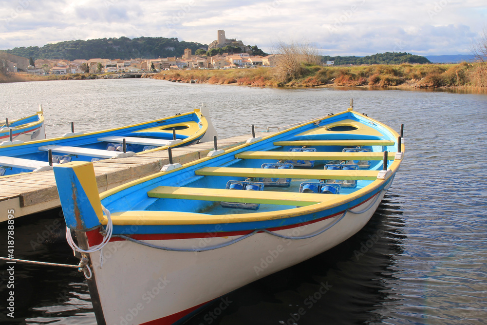 Naklejka premium Beautiful wooden boats in Gruissan, a seaside resort in the Aude department, France
