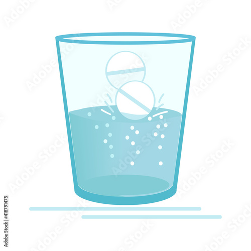 Glass of water and soluble medical tablets.