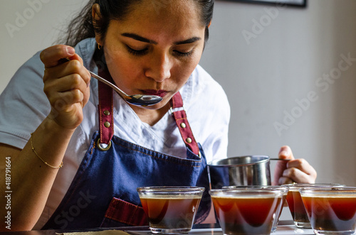 Professional coffee taster testing new smells and flavors