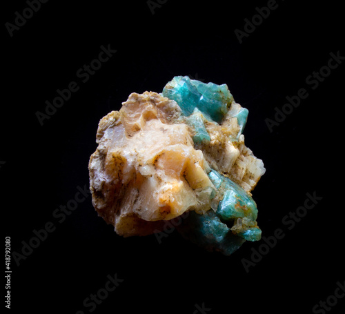 Aquamarine gemstone crystal inside feldspar rock isolated on black. For geology mineralogy magazines websites article, stone collection catalog, Natural Science museum wall chart