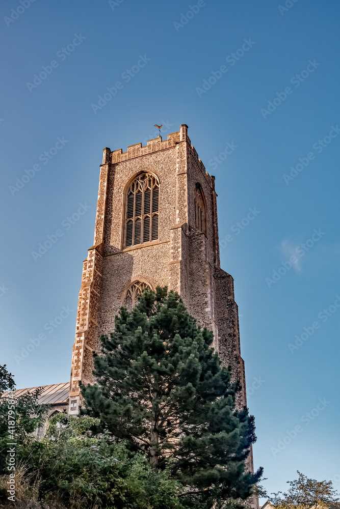 Church spire in the city of Norwich on a bright and sunny day Church spire in the city of Norwich on a bright and sunny day