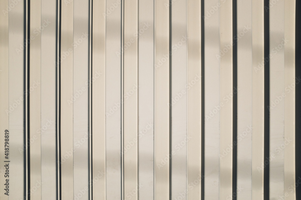 Parallel vertical metallic white stripes Parallel vertical metallic white stripes