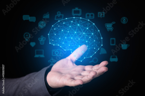 businessmen hand holding  brain of internet of things(IOTs) technology concept