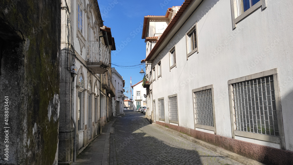 Fão, Esposende, Portugal - January 10, 2021: Located on the Cávado River’s left bank, the typical village of Fao is characterized by a marked neighborhood spirit. The narrow Azevedo Coutinho Street.