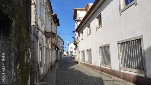Fototapeta Naklejka Na Ścianę i Meble -  Fão, Esposende, Portugal - January 10, 2021: Located on the Cávado River’s left bank, the typical village of Fao is characterized by a marked neighborhood spirit. The narrow Azevedo Coutinho Street.