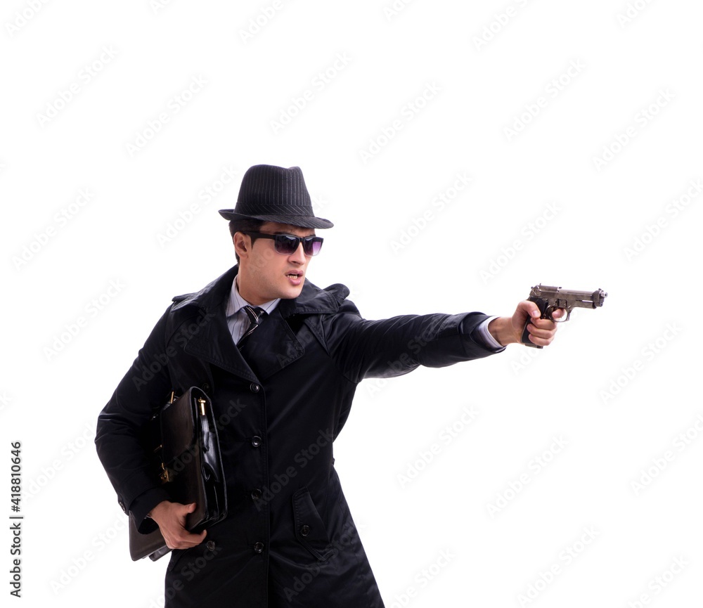 Man spy with handgun isolated on white background Man spy with handgun isolated on white background