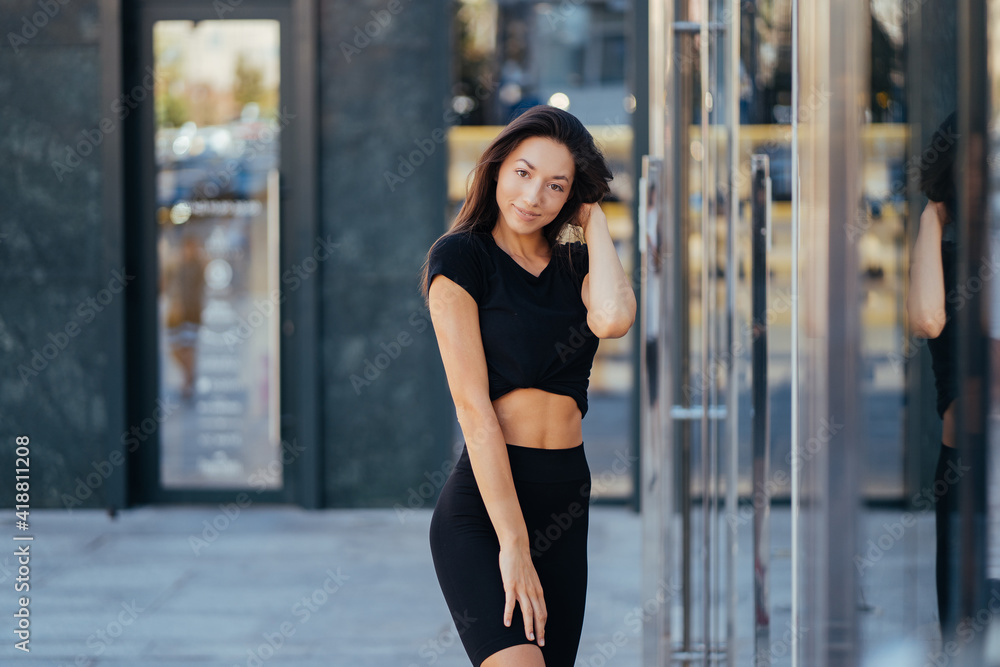 Beautiful woman, summer in city, fitness training on street. Beautiful woman, summer in city, fitness training on street.