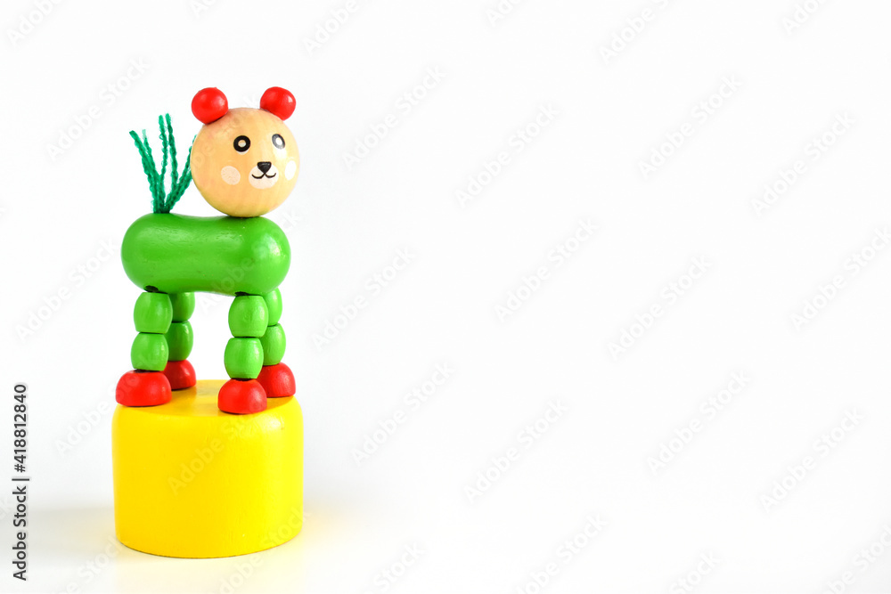 Wooden horse isolated on a white background. A toy made of wood. Wooden horse isolated on a white background. A toy made of wood.