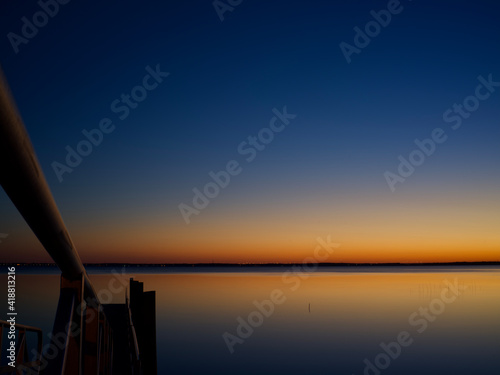 sunset colors at lake Monroe in Sanford Florida photo
