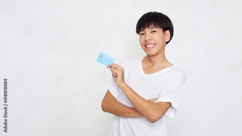 Asian man showing credit card Asian man showing credit card