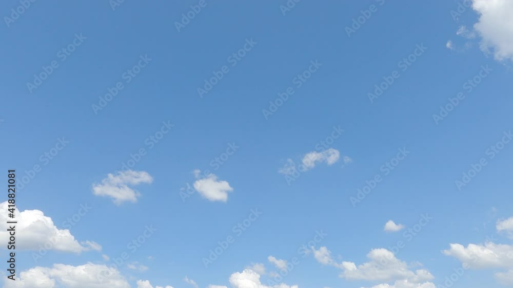 Slow Motion 4k cinemagraph b-roll TimeLapse, Beautiful sunny clear blue sky background with puffy fluffy white cloud n cumulus cloudscape in tropical summer n spring sunlight n sun ray at sunshine day Slow Motion 4k cinemagraph b-roll TimeLapse, Beautiful sunny clear blue sky background with puffy fluffy white cloud n cumulus cloudscape in tropical summer n spring sunlight n sun ray at sunshine day