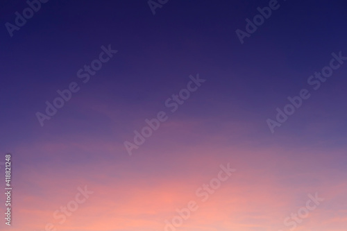 Beautiful morning clear sky background. Colorful yellow blue sky. Morning colorful clear blue sky background with soft white clouds sunrise or sunset. © AKGK Studio