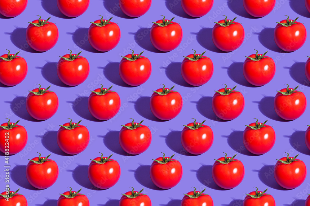 The seamless pattern repeated tomato background image The seamless pattern repeated tomato background image