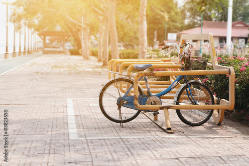 Wallpaper Mural An old bicycle parked in a lane for a bicycle in the park. Torontodigital.ca