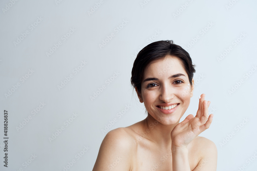 Beautiful brunette clean skin care face dermatology cream Beautiful brunette clean skin care face dermatology cream