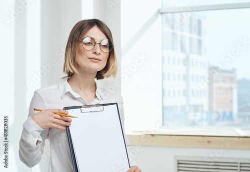 room finance woman business documents interior window