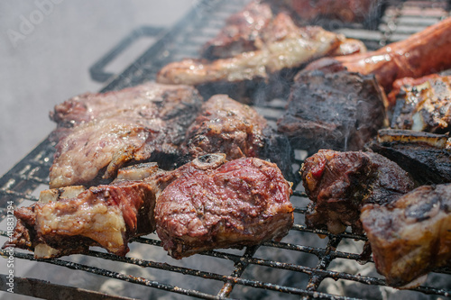 Argentinian grilled meat cooking - asado argentino