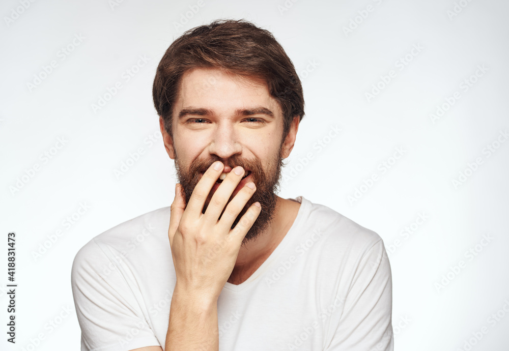 energetic man in white t-shirt gestures with his hands emotions open mouth energetic man in white t-shirt gestures with his hands emotions open mouth
