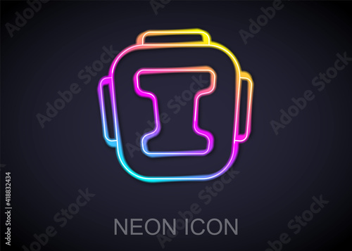 Glowing neon line Boxing helmet icon isolated on black background. Vector.