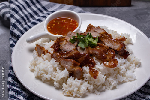 Steamed rice, grilled pork neck with spicy sauce