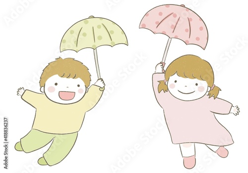 雨傘を持って飛ぶかわいい笑顔の男の子と女の子