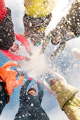 Group of happy friends are having fun at ski resort