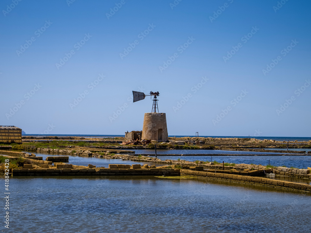 windmill on a salt pan - Trapani, Sicily Italy