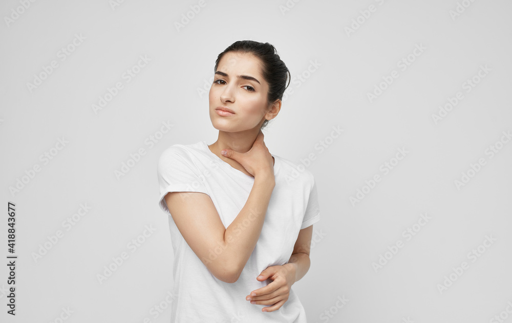 woman holding neck health problems discomfort medicine treatment woman holding neck health problems discomfort medicine treatment