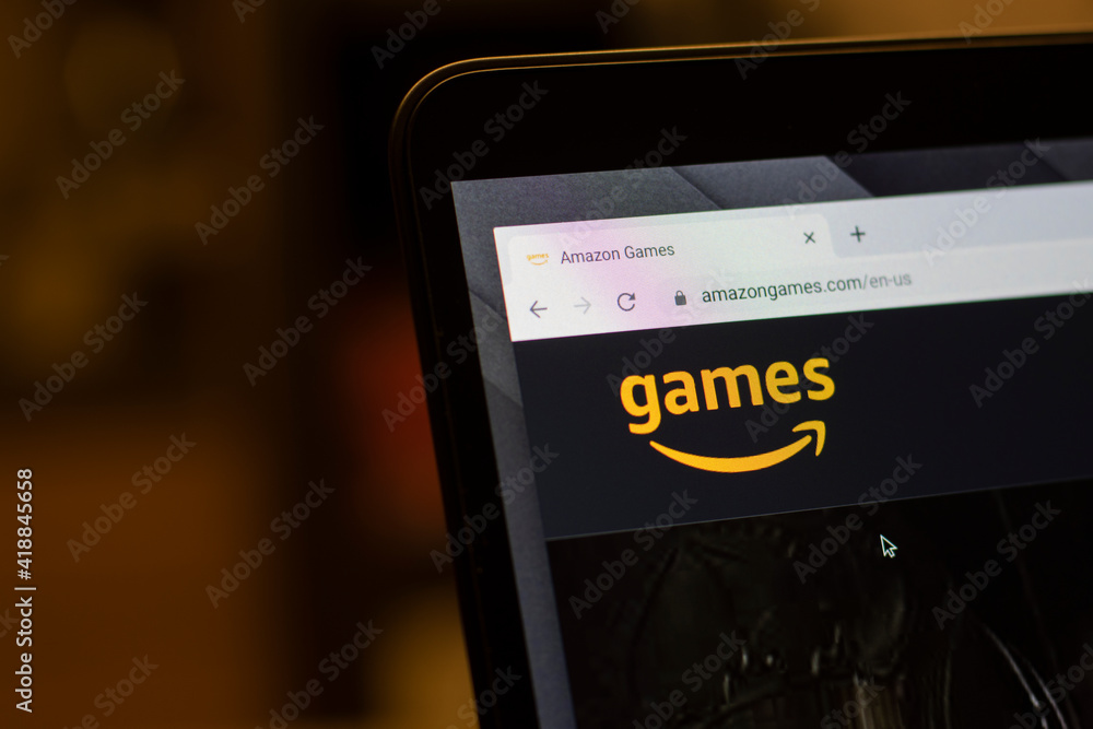 Foto Stock Portland, OR, USA - Mar 7, 2021: The games smiley arrow logo is  seen on the website of Amazon Games, which aims to develop games that  harness the power of