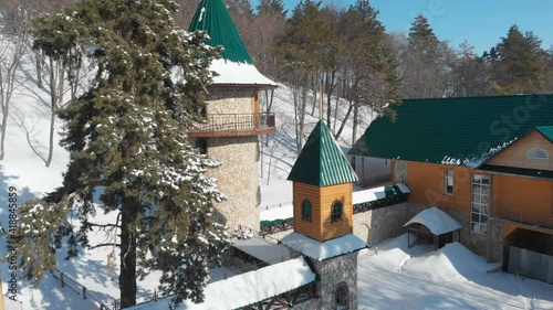 beautiful castle with a tower in winter photo