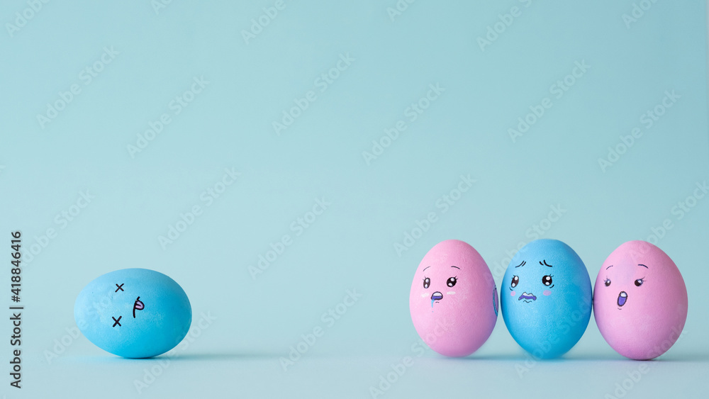 Life tragedy. Loss grief. Compassion mourning. Conceptual composition. Sad shocked devastated color egg crowd watching unconscious victim lying isolated on blue copy space background. Life tragedy. Loss grief. Compassion mourning. Conceptual composition. Sad shocked devastated color egg crowd watching unconscious victim lying isolated on blue copy space background.