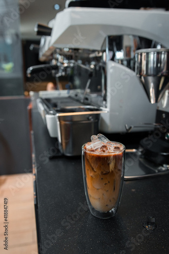 glass of iced coffee with milk on the table